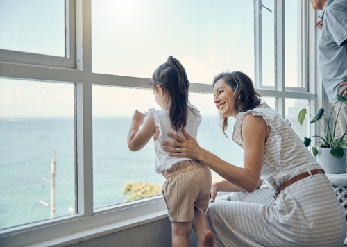 Family,View,,Window,And,Mother,With,Child,Bonding,,Having,Fun